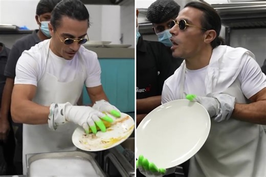 Salt Bae washes dishes in front of staff who give him round of applause
