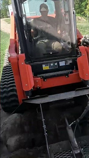 Land Leveler on gravel driveway