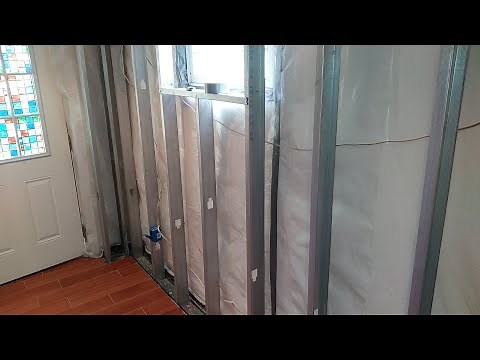 How to install a waterproof vapor barrier before finishing your basement walls