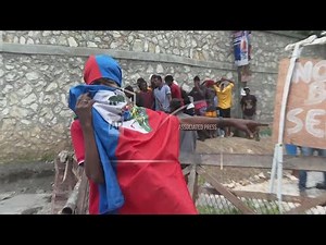 Protesters in Haiti demand protection against gangs.