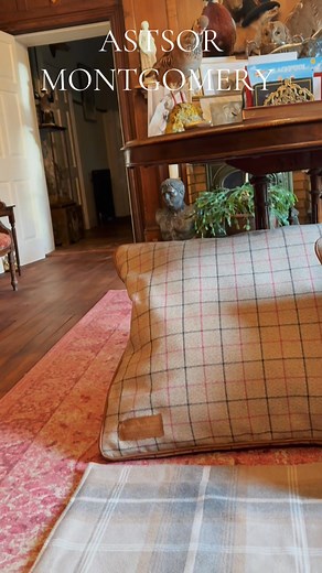 ASTOR MONTGOMERY — THE CANINE COLLECTION Where heritage meets devotion. Introducing the Astor Montgomery Canine Collection — a refined world of canine home furnishings and accessories, handcrafted in the United Kingdom for those who believe their dogs deserve the same standard of living as they do. Crafted in signature washable tweeds and finished with the Astor Montgomery monogram, each piece is designed not as a pet product — but as part of the home. This is interior design for dogs. THE COLLE
