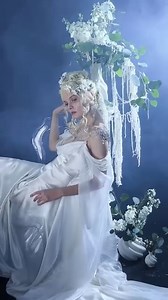 Vaelis Gown 🕊️ One-of-a-kind Cut from ivory silk charmeuse, the gown drapes with effortless grace, flowing into a long, trailing train. Sheer silk chiffon falls from the shoulders like captured moonlight. The look is completed with bespoke shoulder jewelry, a special collaboration with Sophia Putman @au.elements.jewelry, who brought my jewelry designs to life with extraordinary craftsmanship. Hand-forged in sterling silver and set with moonstone and clear quartz semi-precious stones, the pieces