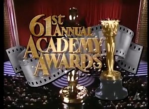 John Lasseter and William Reeves win the Oscar for Short Film (Animated) for Tin Toy, and Dean Parisot and Steven Wright win the Oscar for Short Film (Live Action) for The Appointments of Dennis Jennings at the 61st Academy Awards. | The Academy