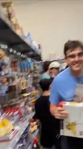 😱🛒 Scalper vs. Scalper: The Pokémon Card Cart Heist Showdown! 🛒😱 It was restock morning at Walmart — that sacred hour when boxes of fresh Pokémon cards hit the shelves. Two seasoned scalpers stood nearby, each pretending not to notice the other. Their eyes locked on the same prize: a mountain of Evolving Skies booster boxes rolling out on the stock cart. Scalper A struck first, loading his cart with ruthless precision — grab, stack, repeat. Within seconds, he’d cleared half the shelf. But ju