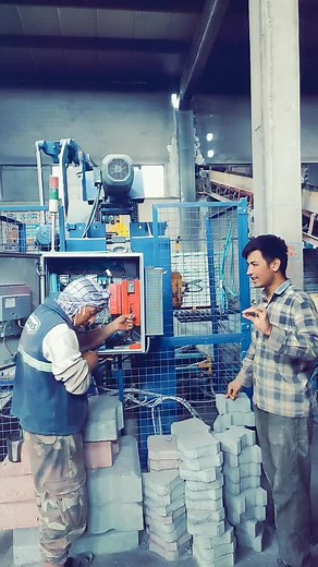 Manual Brick-Making Process in Industrial Setting