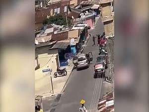 Daylight robbery at Adabraka Market in Accra: Armed men flee with bags of cash