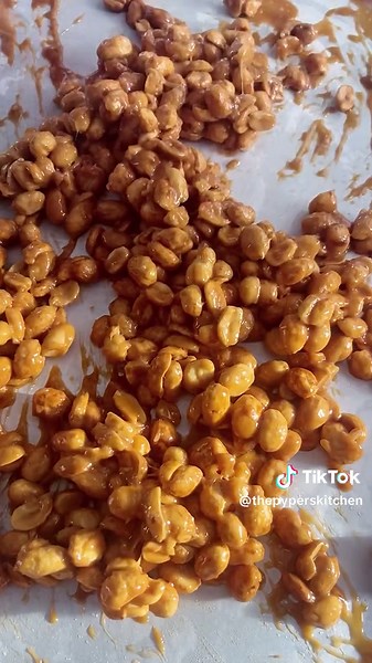 Butter Toffee Peanuts. Recipe-ish: 1/4 cup sugar 1/4 cup brown sugar 1/4 cup butter 1/4 cup corn syrup 1/2 tsp kosher salt 3 cups roasted salted peanuts . Full instructions on my website: https://www.thepyperskitchen.com/butter-toffee-peanuts/