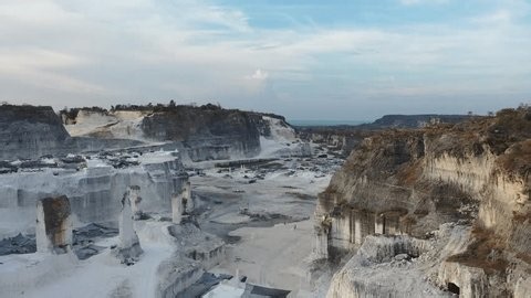 clip-3744640479-limestone-quarry-industrial-facility-that-extracts-earth