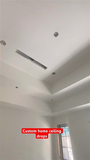 Custom home ceiling drops finished by drywall and mud putty