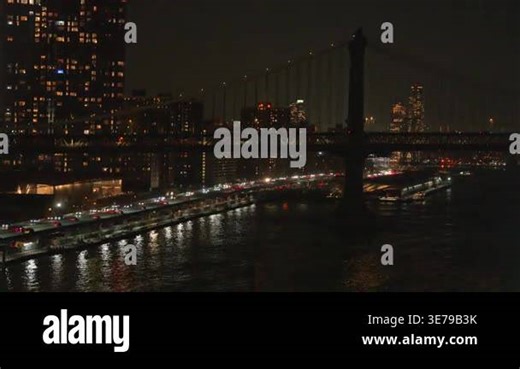 Night view of Manhattan Bridge with traffic lights and reflections Stock Video Footage - Alamy