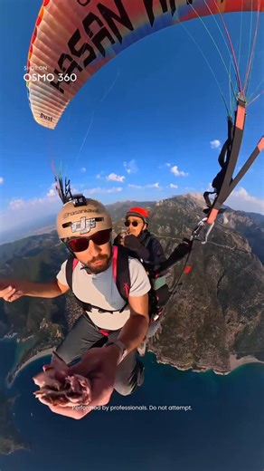 Crazy hot-air-balloon skydiving with #Osmo360 🤯 He smiles and eats pizza mid-air, drifting through a sky washed in blue and gold — fearless, unbothered, and completely alive. 🪂✨ 🎬: hasan_kaval #DJI #DJIOsmo #Osmo360 #Skydiving #ExtremeSports #AdventureVibes #Freefall #AdrenalineRush #EpicShots #UnrealMoments | DJI