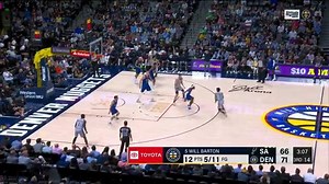 Nikola Jokic with the block