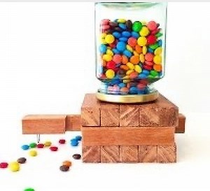 This m&m dispenser looks so good & is a brilliant gift. It's quite easy to make & super cheap with one piece of wood & a repurposed glass jar 🎁 | Ann Reardon How To Cook That