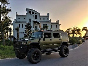 Lifted Hummer H2 doing a take off and drive by video