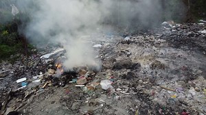 Rotating tracking open burn rubbish at illegal dumping