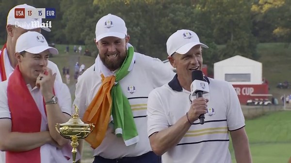 Europe's Ryder Cup winners lift trophy as crowd cheers