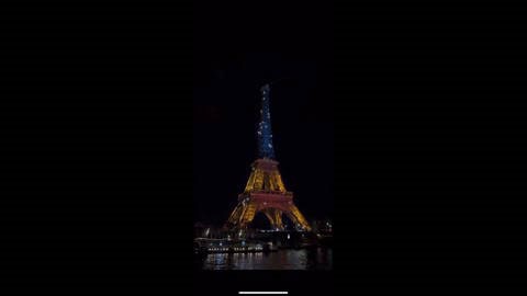 France: Eiffel Tower Lit In Ukrainian Colors To Mark Third Anniversary Of Ukraine Invasion