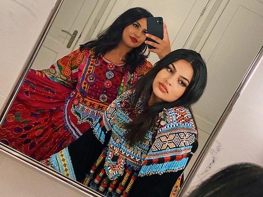 Afghan women dress up in colourful attire in ‘fight for identity’