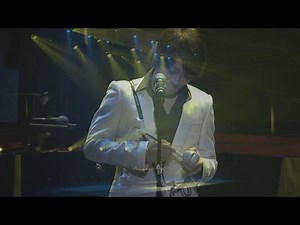 Masayoshi Soken sings La Hee while playing the Otamatone