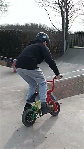 Doing a wall ride on a mini rocker