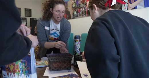 'It's foundational to everything': Volunteers pack 8,000 books for Omaha students in honor of MLK Day