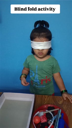 Susmitha R on Instagram: "Blind fold Activity 💫. To enhance children's tactile sense, concentration, & cognitive development through a fun, hands on sorting game. In this activity children are blindfolded & asked to sort a varied of objects. . . . . . #babygirl#instababy #babylove #3yrsold #instagood #instamood❤️ #blindfoldchallenge #learnathome #learnbymom"