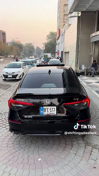 Honda Civic RS 2025 — The Premium Sports Sedan 🚘✨ 7,000 km Driven Only — Showroom Fresh Condition 📍 Islamabad Registered Total Genuine • No Paint Work • No Touchups Black Exterior paired with a Burgundy Luxury Interior — A true head-turner 🖤❤️ Smooth Drive • RS Performance • Pure Class 💯 🔥 Serious RS Lovers — Don’t Miss This! 📱 WhatsApp: 0300-5837773 📍 Available At Peshawar Cantt #HondaCivicRS #ShiftingWheelsPK #LuxurySedan #BurgundyInterior #LowMileage