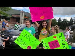 Kettle Moraine Lutheran HS Cheer Team car wash