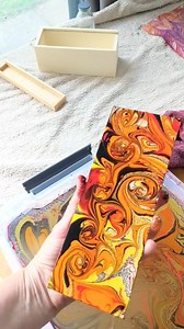 Water Marbling a balsa wood pencil box lid. Balsa wood marbles extremely well without prepping, and the paint really soaks into it, so you don't have to seal . | Raynbow Crow Studios
