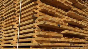 Timber processing at the sawmill. Woodworking industry. 4k video.