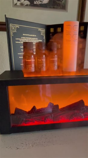 Beautiful log fireplace diffuser/humidifier/purifier comes with three oils, remote and USB adapter. 10 straight hours of run time before it needs a refill, automatic shut off, one, three, five hour timers, customizable lights. #EssentialOils #Diffuser #Humidifier #airpurifier