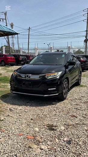 💯💯The 2018 Honda Vezel Hybrid is a compact crossover SUV that combines a hybrid powertrain with a stylish design and practical features. The Vezel is known for its fuel efficiency, practicality, and advanced safety CALL ☎️☎️ 0748399843 ASKING 2,650,000 DEPOSIT 1,300,000 Powertrain: \t•\tEngine: It is equipped with a 1.5-liter i-VTEC engine paired with an electric motor, which together provide a total system output of around 137 horsepower. \t•\tTransmission: The car uses a Continuously Variabl