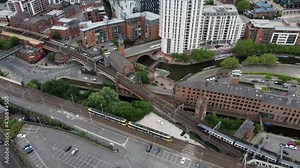 trains arriving at Deansgate railway station, Rochdale canal, Castlefield, Manchester, England