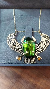 A 14k gold Egyptian Scarab, set with a genuine scarab beetle. The Scarab is the ancient Egyptian symbol of the Sun, the solar power, and the eternity of the soul. | Ka Gold Jewelry