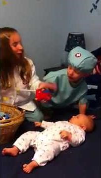 Kids playing doctor with baby sister