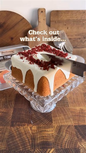 Mile High Heart Inside Boxed Mix Cake in the Old Country Kitchenware Square Tube Pan! 1 box red velvet cake mix (15.25 oz size) Additional ingredients to prepare cake mix according to package directions 2 boxes white cake mix (15.25 oz size) Additional ingredients to prepare cake mix according to package directions 1 tub vanilla frosting Prepare red velvet cake mix according to package directions for a 9x13 pan. Let cool (freeze if time permits). Cut as many hearts as you can from the cake and r