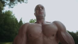 Man show his muscle body bodybuilder