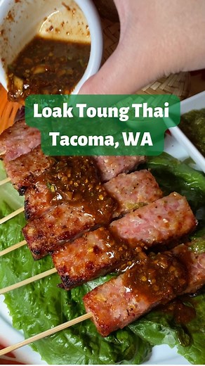 Erika Diama | Food & Travel Content Creator, Seattle - Tacoma on Instagram: "Looking for a unique Thai food experience in Tacoma? Check out @loaktoungthai where they serve authentic Isaan cuisine. Isaan is the northern region in Thailand, with food influenced by both Laos and Cambodia. Loak Toung Thai is a family owned business who takes pride in their great food and friendly service. Items ordered: Spicy Basil Eggplant (with protein of choice) Som Tum (Papaya salad, choose between Thai or Lao s