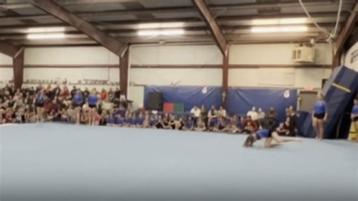 Christmas gymnastics show features a slip as gymnast botches flip before large audience
