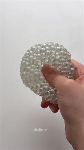 Jolijolie on Instagram: "Clear glass-bead stress ball with full alien-energy 👽💎 obsessed with the sparkle + crunch #stressball #asmr #satisfying #diysquish #sensory #fidgettoy #crunchy #oddlysatisfying #mochichi #relaxing"