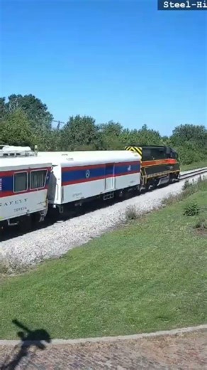 WB IAIS 705 with FRA Cars in West Liberty, IA on August 17, 2023