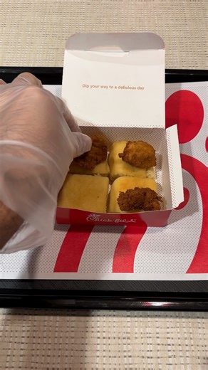 Chick-n-Minis. It's a science. Warm, bite-sized Chick-fil-A® nuggets tucked inside fluffy mini yeast rolls and brushed with honey butter—it’s the perfect balance of comfort and crave-worthy flavor. Whether you’re grabbing breakfast on the go, sharing a tray with your team, or just treating yourself, Chick-n-Minis always hit the spot. Breakfast never looked so good. ⏰ Available during breakfast hours at Chick-fil-A. | Chick-fil-A Carrollton