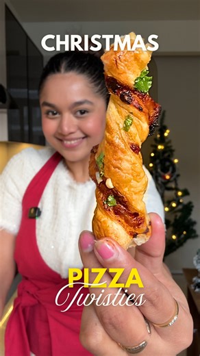 Khushi Baranwal on Instagram: "Cheese Pizza Twisties ⬇️ These are the softest, flakiest, crispiest, most buttery puffs you can make at home in under 5 minutes of prep! I used puff pastry sheets (they’re easily available online). Spread a generous layer of Dr. Oetker FunFoods Pizza & Pasta Red Sauce, sprinkle loads of cheese (mozzarella / cheddar / processed — anything works and tastes amazing), then cover with another pastry sheet. Cut into strips, twist them, and brush with egg wash (1 egg + a 