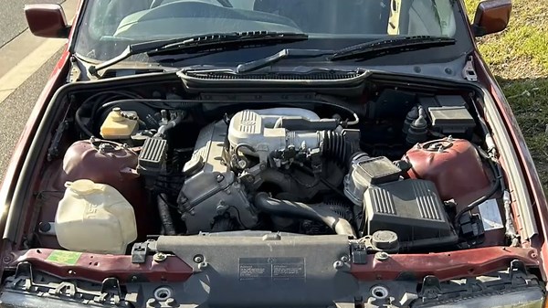 BMW pulled over without bonnet, driver's seat in Melbourne