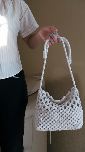 Macrame • Handmade • Tutorial • Fiber Arts on Instagram: "Newly made macrame bag with bow on the strap, intentionally make the strap longer so we can tie a bow🎀 It’s kinda multifunction bag, tie the bow bigger for a shorter strap as shoulder bag or smaller for a longer strap as a sling bag. It’s depends on your mood✨ Please let me know what do you think about this bag✌🏼 Will upload the tutorial on my YT channel tomorrow, comment “bow strap” for the link〰️ . . . #macrametotebag #macramemarketba