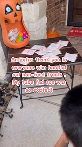 Although he still loves to take the candy, there were so many homes with non-candy trick-or-treating this year for my tube fed kiddo who can’t eat candy. He was so excited when he got home to see his loot. #RicoSuave #TubeFed #Halloween #NoCandyHalloween | Real Life Foster Mom