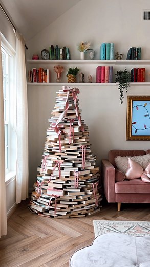 Michelle Hsu | Bringing back a favorite, the Christmas book tree! It took me 3 tries to build this🫠 At first it was leaning too much to one side and then... | Instagram
