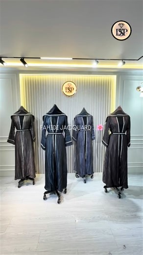 DSP The Abaya Store on Instagram: "Fahidi Jacquard Abaya 🏷️8345 NU Elevate your modest wardrobe with this elegant Fahidi Jacquard abaya, crafted for a graceful and refined look. Designed in rich dark tones, this abaya features a subtle jacquard texture that adds depth and luxury to the fabric. The front-open style is highlighted with fine vertical detailing, enhancing the silhouette while keeping it sleek and modest. The abaya comes with a structured hood-style neckline and wide sleeves finishe