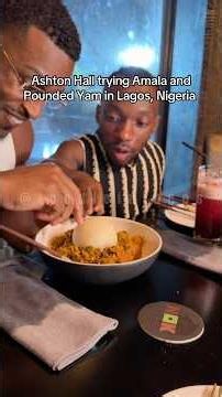 Ashton Hall trying Nigerian local food in Nigeria ‪@AshtonHallOfficial‬