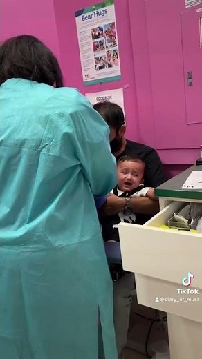 Baby boy getting blood drawn